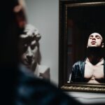 man in front of the mirror